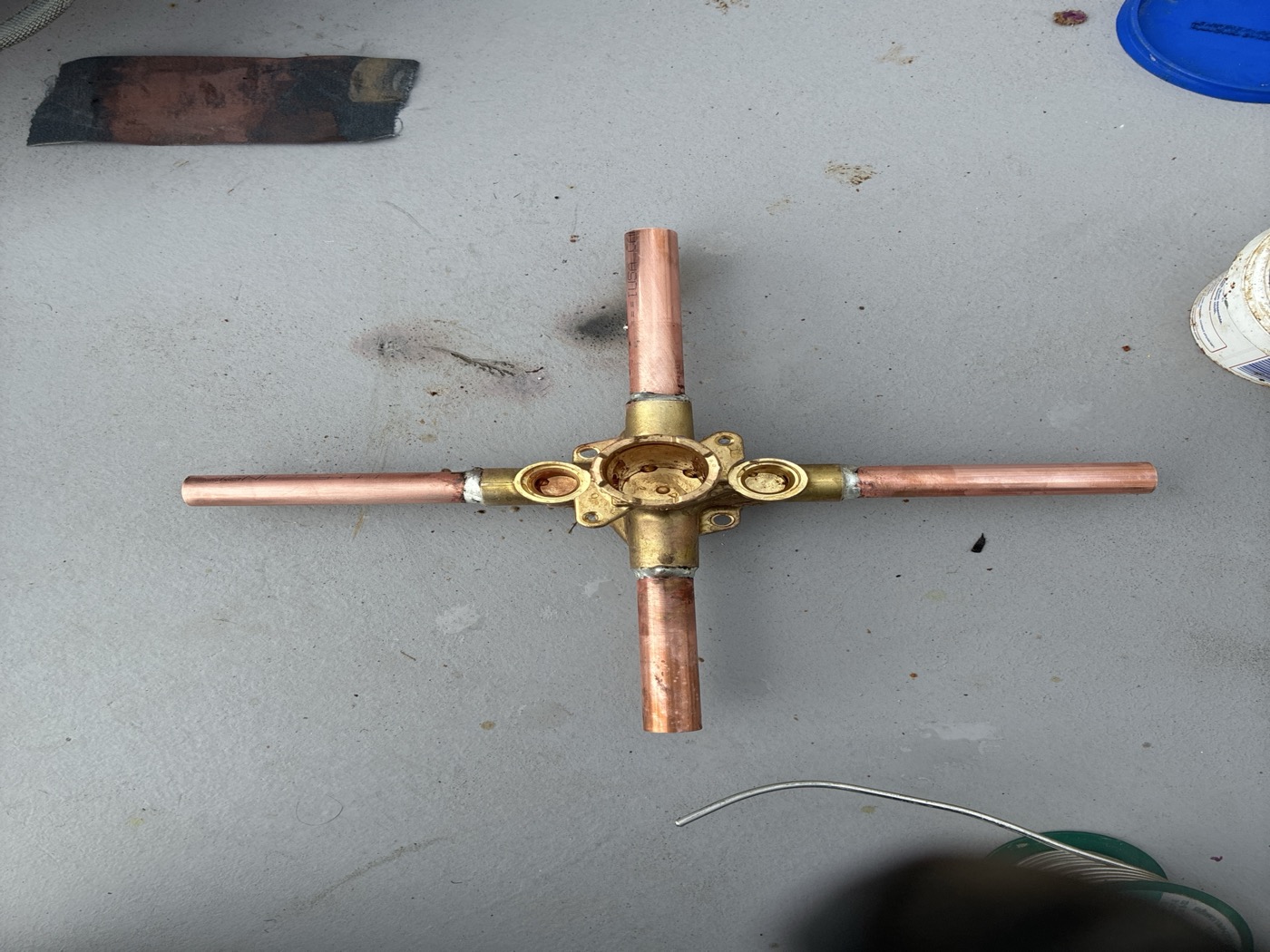 Copper manifold assembly staged before installation
